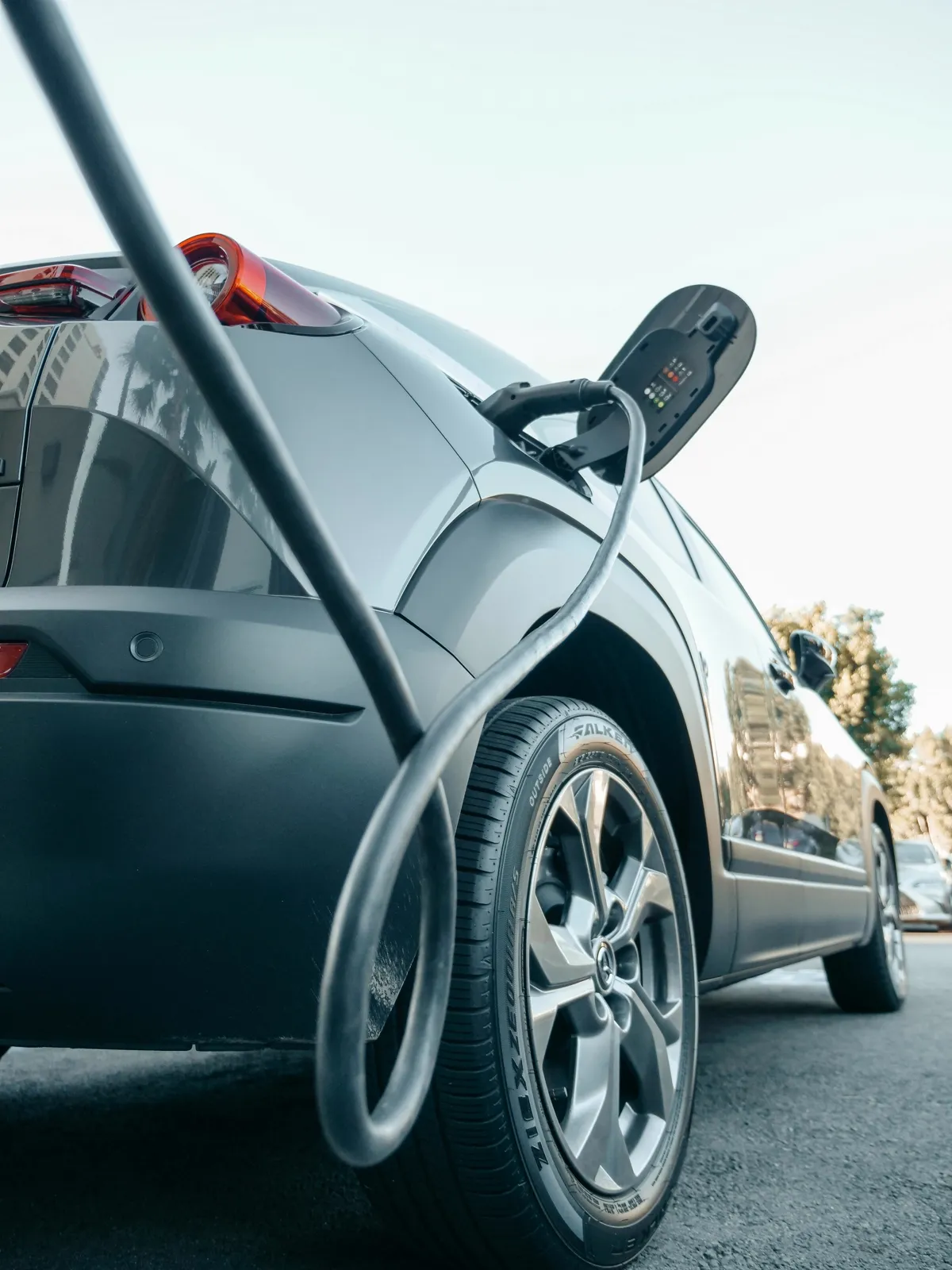 Licensed electrician installing a residential EV charging station in Fresno, California